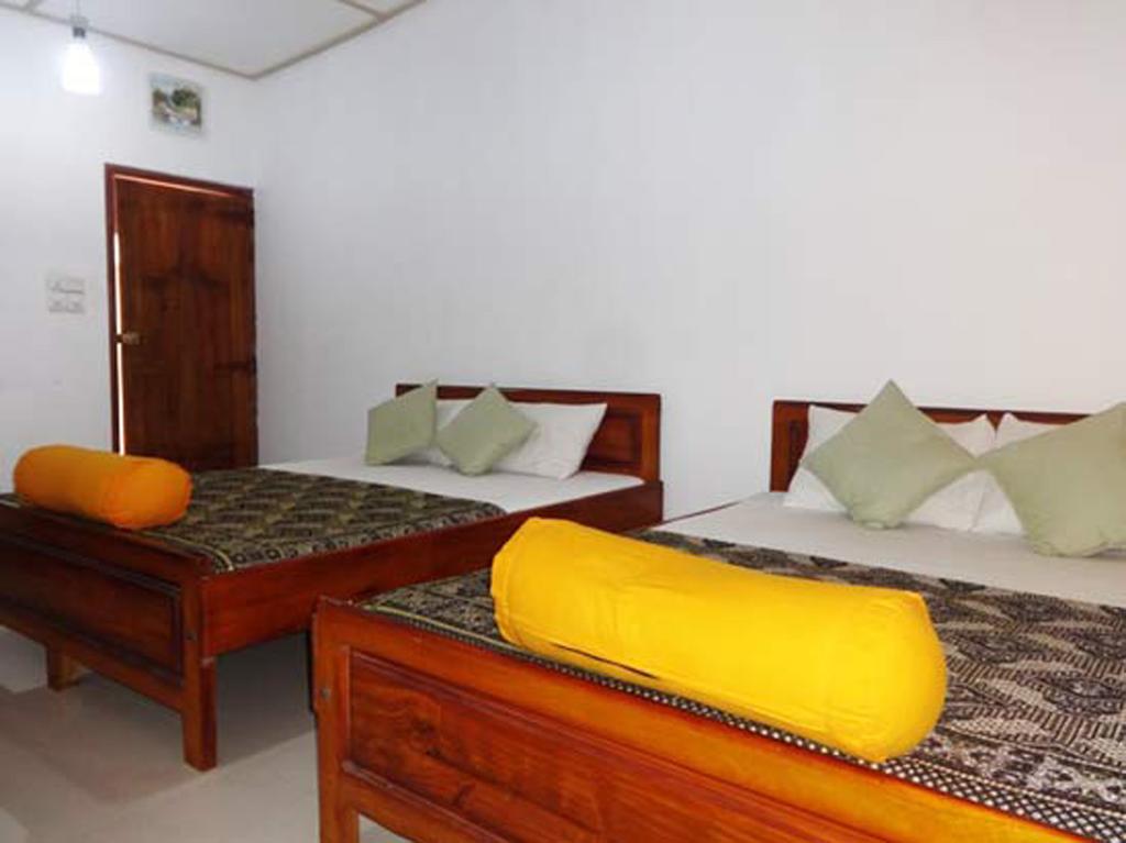Dutch Bay Beach Cottages Trincomalee Rom bilde